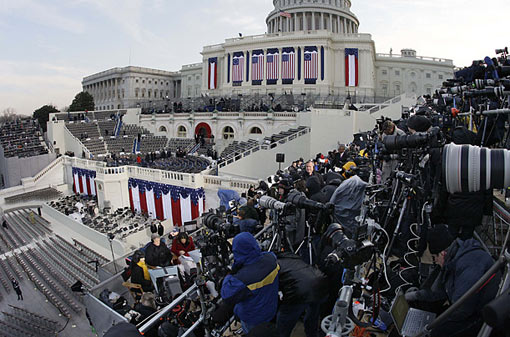 journalists take their positions around the Inauguration stand