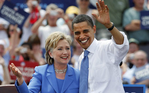 U.S. president-elect Barack Obama takes the stage with Senator Hillary Rodham Clinton at a campaign event in Unity, N.H.