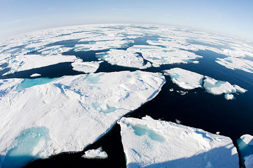 Ellesmere Island was once entirely ringed by a single enormous ice shelf that broke up in the early 1900s. All that is left today are four much smaller shelves. Here,ice floats in Canada's Baffin Bay above the Arctic Circle on July 10