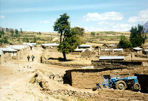 houses & tractor in Valle de Colca, Peru