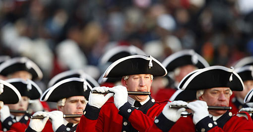 a marching band walks down Pennsylvania Avenue during the Inauguration parade 