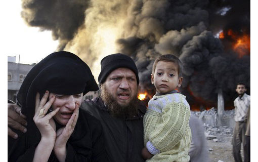 a Palestinian man tries to get his family to safety