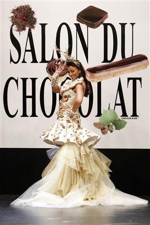 Former Miss France 2007 Rachel Legrain-Trapani presents a creation by Jean Doucet and Ghraoui Chocolatier at the 14th Salon du Chocolat (Paris Chocolate Show) in Paris October 28, 2008