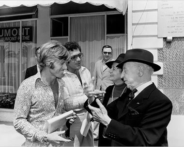 Robert Redford and Sydney Pollack at the 1972 Cannes Film Festival, with pianist Arthur Rubinstein and his wife Nela