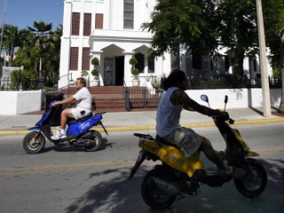 Scooter owners don't have to fill up as much when one tank of gas allows them between 50 to 100 m.p.g.