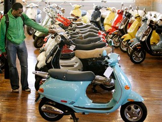 Local scooter shops are seeing an increase in sales after the rise of gas prices