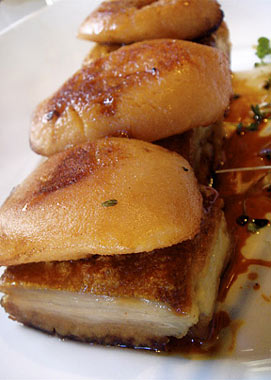 at The Press Club, Chef George Calombaris serves crispy slow-cooked pork belly with new season quince as an orektika, greek for small dish