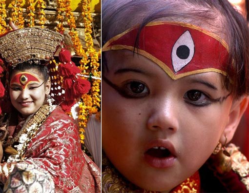 a young Nepali child takes part in a ceremony in Durbar Square, Kathmandu, 15 September 2007, during which she is worshipped as 'Kumari' or Living Goddesses. Some 300 young girls took part in the ceremony in the Nepali capital. Kumari, or Kumari Devi is a living goddess in Nepal