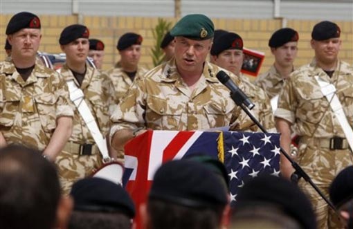 British Maj. Gen. Andy Salmon speaks during hand over ceremony in Basra, Iraq