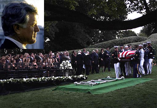 The Kennedy family gathers around the grave site as an Honor Guard carries the casket of Sen. Ted Kennedy at Arlington National Cemetery. Sen. Edward M. Kennedy made his last journey through the nation’s capital on Saturday as thousands cheered the Massachusetts Democrat during the slow, winding trip to a final resting place next to his two brothers at Arlington National Cemetery.