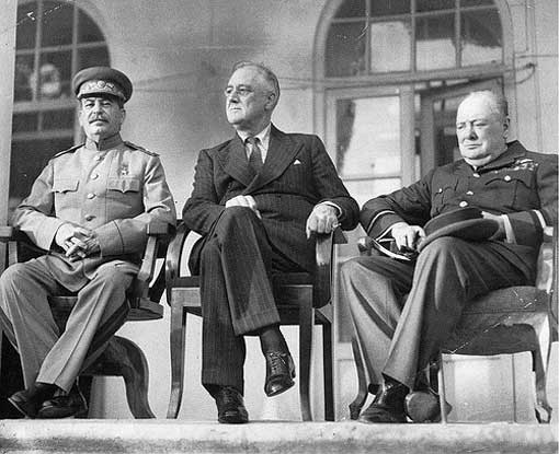 Franklin D. Roosevelt, Joseph Stalin, and Winston Churchill on the portico of the Russian Embassy during the Tehran Conference (codenamed Eureka) November 28 and December 1, 1943 (World War I).