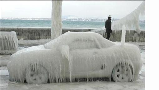 cars encased in ice, immobile