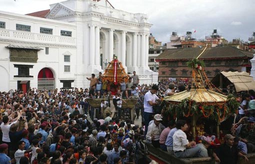 the chariot of the Living Goddess and other deities is paraded around town for worship on the last day of the Indra Jatra festival in Kathmandu September 19, 2008