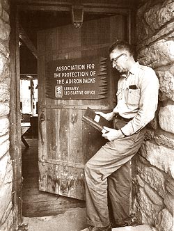 Paul Schaefer opens the doors to the Library and Legislative Headquarters of the Association for the Protection of the Adirondacks in 1963. As an 11-year-old boy in 1919, Paul Schaefer made his unflagging commitment to the wilderness until his death in Schenectady in 1997 at the age of 87. Schaefer preserved the memento of that occasion in a leather change purse. In the decades between, this son of the Mohawk Valley worked to protect and preserve wilderness tirelessly.