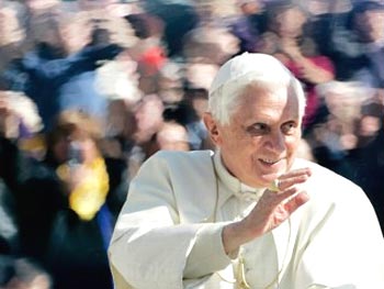 Pope Benedict XVI waves to faithful during the weekly general audience in St. Peter's square at the Vatican, March 11, 2009. Pope Benedict XVI has acknowledged Vatican mistakes in the handling of the controversy over a Holocaust-denying bishop and says he's saddened by attacks against him by even members of his own flock