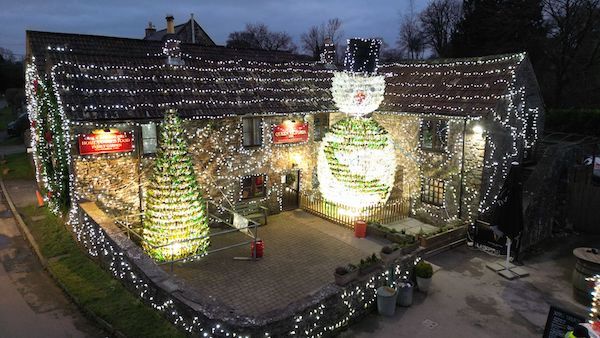 55,000 lights and a snowman made from empty bottles at UK's "most festive pub"